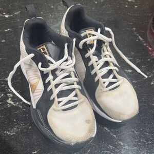 Nike Black and White Sneakers with Gold Swoosh